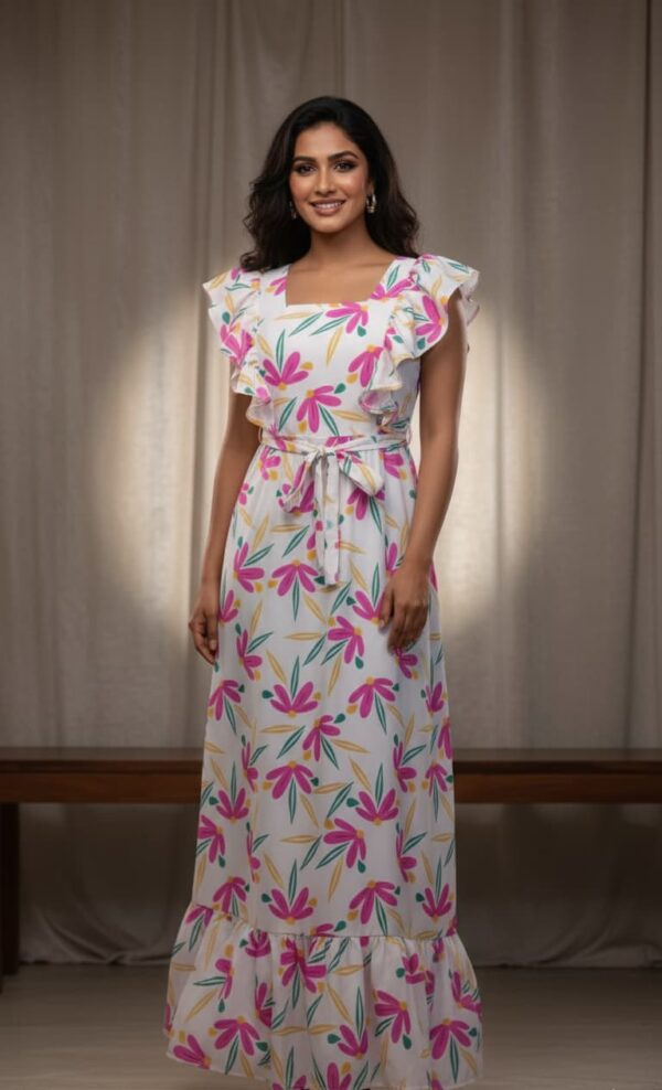 Floral Fiesta Maxi Dress with ruffle details and vibrant flower prints, ideal for summer events.