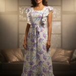 Lavender Blossom Maxi Dress with floral prints, ruffles, and a flattering silhouette, ideal for elegant summer occasions.