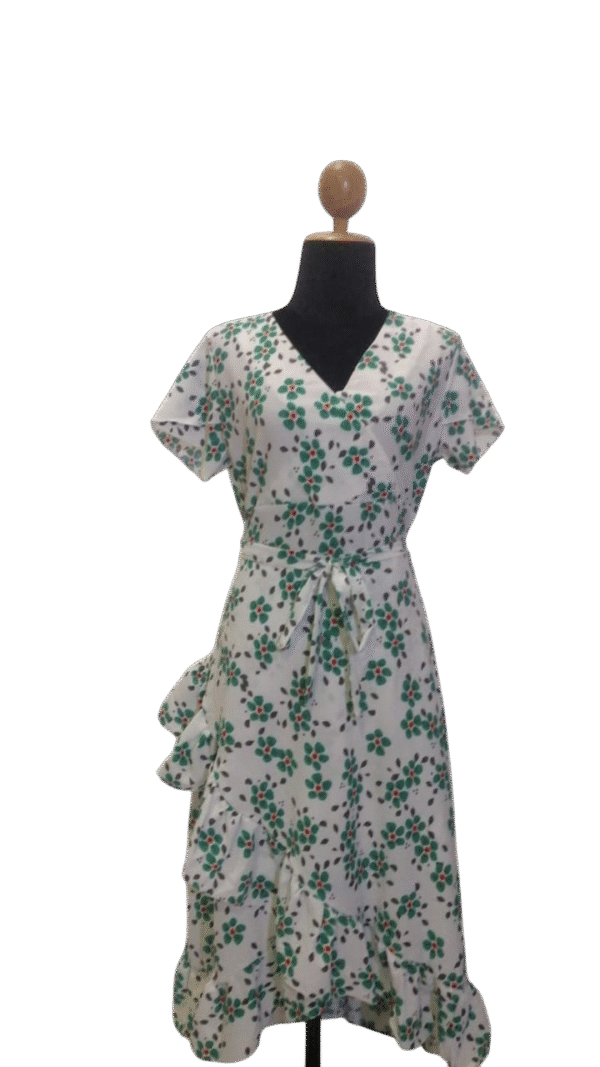 Green floral midi dress featuring a vibrant flower print, perfect for spring and summer outfits.